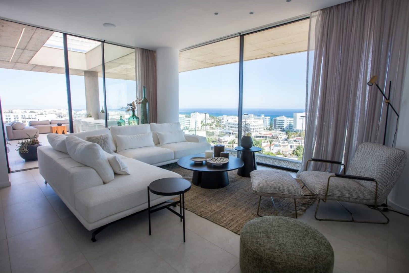 Eden_Residences_-_Living_room_with_sea_view_daytime_1.jpg